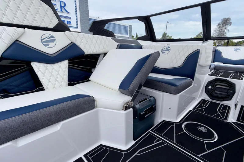 Slide: The Image of Interior of 2027 Tigé 24RZX boat with luxurious seating and modern design. - 30