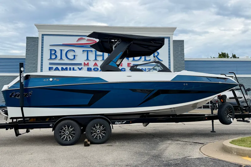 Slide: The Image of 2027 Tigé 24RZX boat on trailer at Big Thunder Marine dealership. - 47