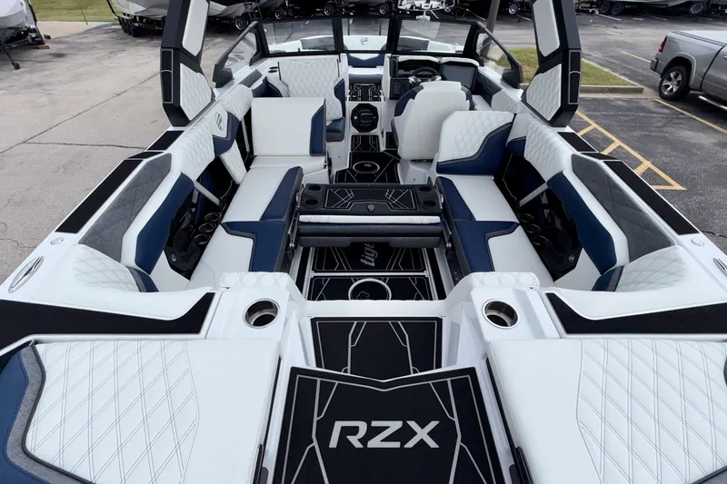 Slide: The Image of Luxurious interior of 2027 Tigé 24RZX boat with stylish seating and modern design. - 21