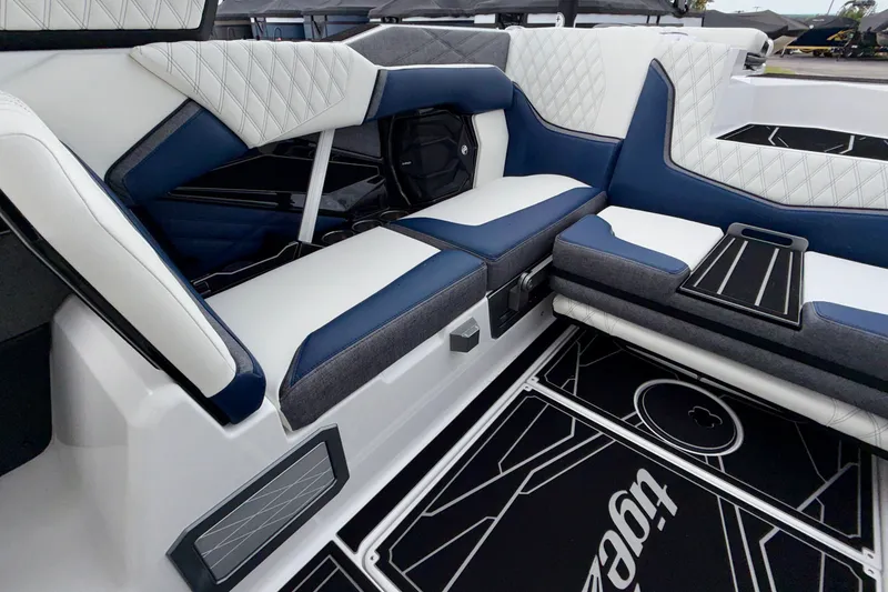 Slide: The Image of Luxurious interior of 2027 Tigé 24RZX boat with stylish seating and modern design. - 25