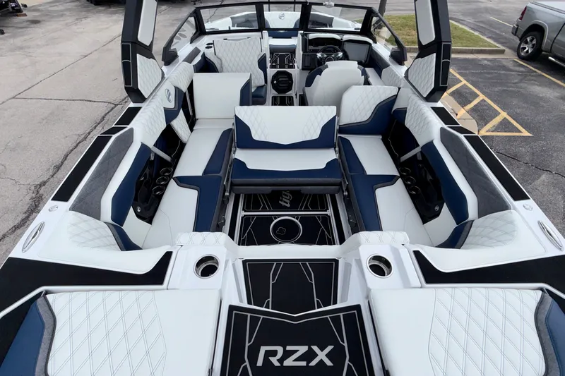 Slide: The Image of Luxurious interior of 2027 Tigé 24RZX boat with stylish seating and modern design. - 23