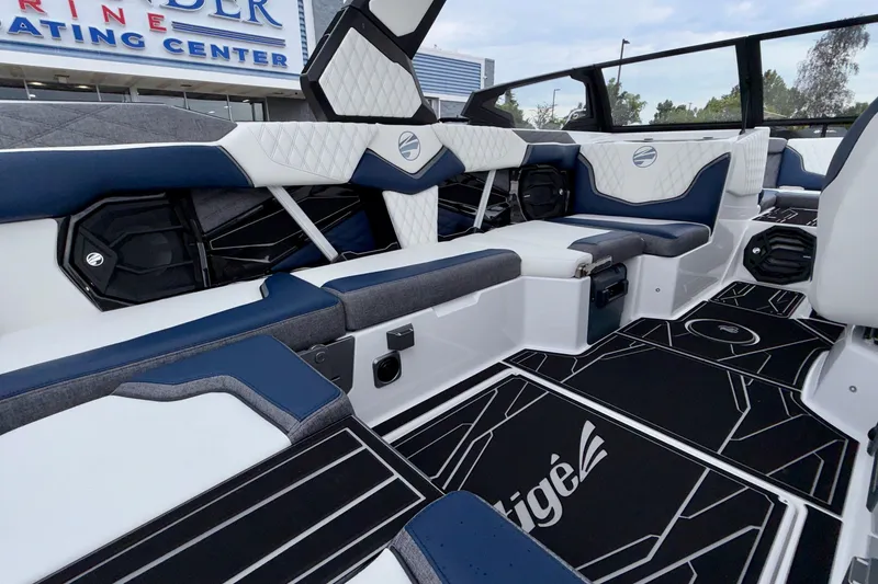 Slide: The Image of Luxurious interior of 2027 Tigé 24RZX boat with modern seating and stylish design. - 29
