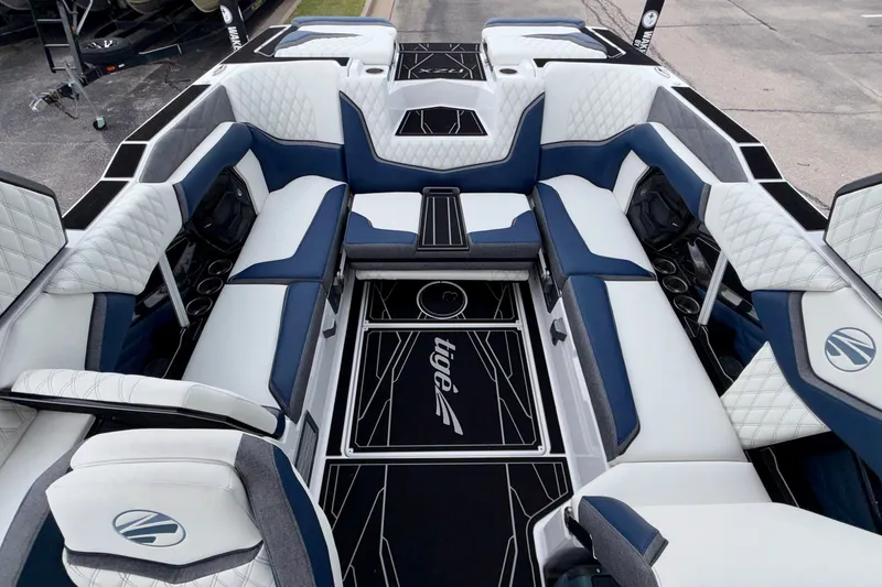 Slide: The Image of Luxurious interior of 2027 Tigé 24RZX boat with stylish seating and modern design. - 24