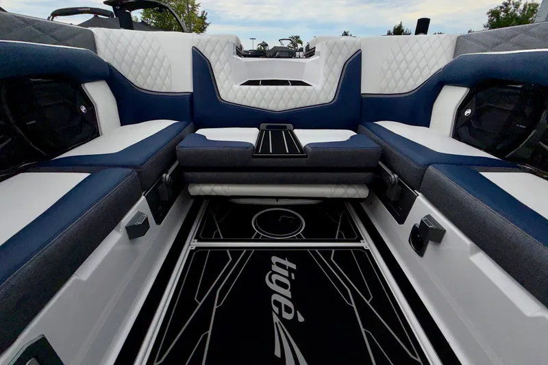 Slide: The Image of Interior of 2027 Tigé 24RZX boat with luxurious seating and modern design. - 26