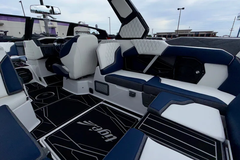 Slide: The Image of 2027 Tigé 24RZX boat interior with modern seating and sleek design. - 28