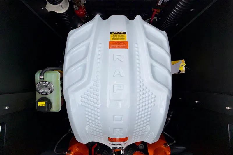 Slide: The Image of Engine compartment of 2027 Tigé 24RZX boat featuring Raptor engine cover. - 20