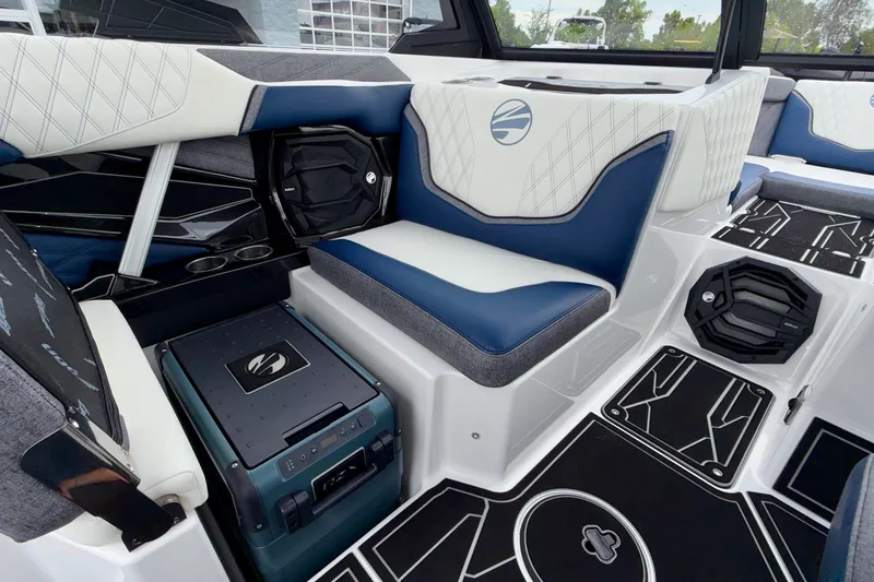 Slide: The Image of Interior of 2027 Tigé 24RZX boat featuring luxurious seating and modern design elements. - 31