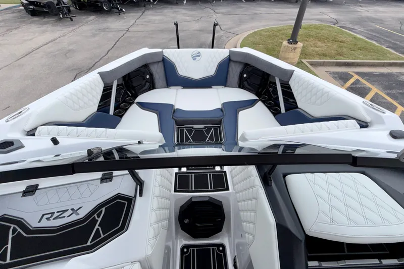 Slide: The Image of 2027 Tigé 24RZX boat interior with luxurious seating and modern design. - 35