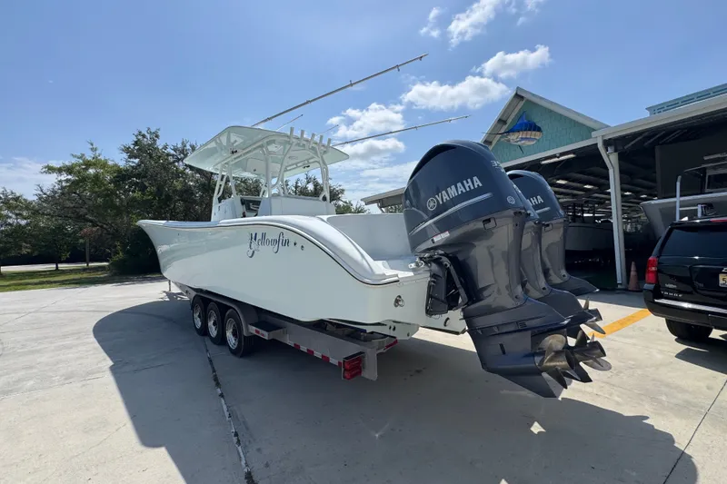 Slide: The Image of 2014 Yellowfin 39 Offshore boat with Yamaha engines on a trailer. - 23