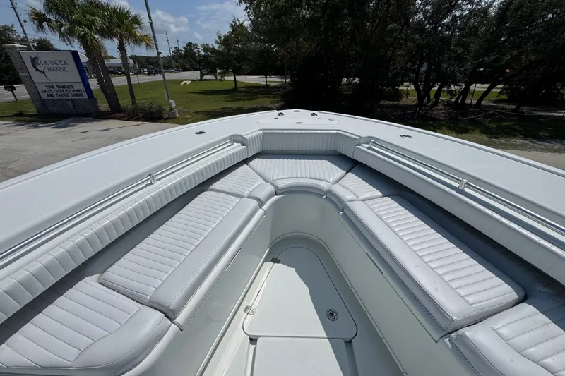 Slide: The Image of 2014 Yellowfin 39 Offshore boat with spacious white seating area. - 25