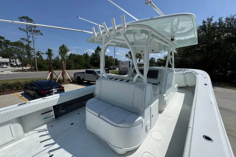 Slide: The Image of 2014 Yellowfin 39 Offshore boat with spacious deck and seating area. - 41