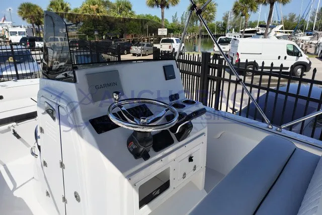 Slide: The Image of The image shows the helm of a Stingray 17 CC boat with Garmin navigation. - 5