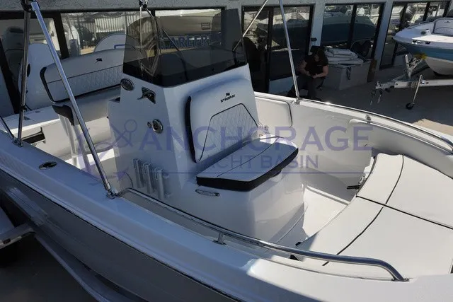 Slide: The Image of A modern 2027 Stingray 17 CC with a white hull and central console. - 4