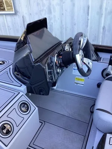 Slide: The Image of The image shows the cockpit of a G3 Sportsman 1810 SE with a modern helm station. - 14