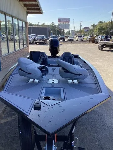 Slide: The Image of The image shows a 2026 G3 Sportsman 1810 SE boat in a parking lot. It has two seats and a visible motor. - 19