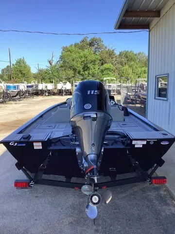 Slide: The Image of The image shows a 2026 G3 Sportsman 1810 SE boat with an outboard motor. - 2