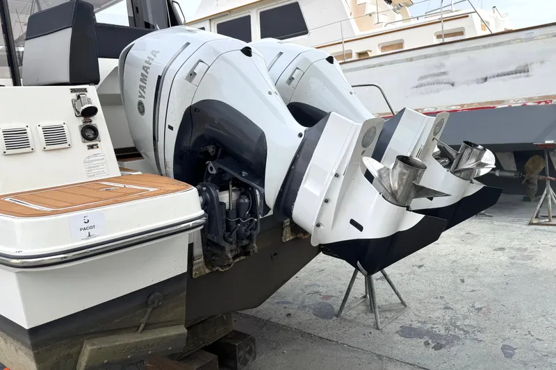 Slide: The Image of 2021 Jeanneau NC Weekender 1095 with dual Yamaha outboard engines. - 7