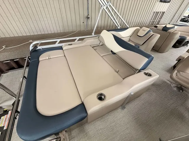 Slide: The Image of The image shows the beige and blue upholstery of a 2027 Avalon LSZ 2385 VRB. - 12