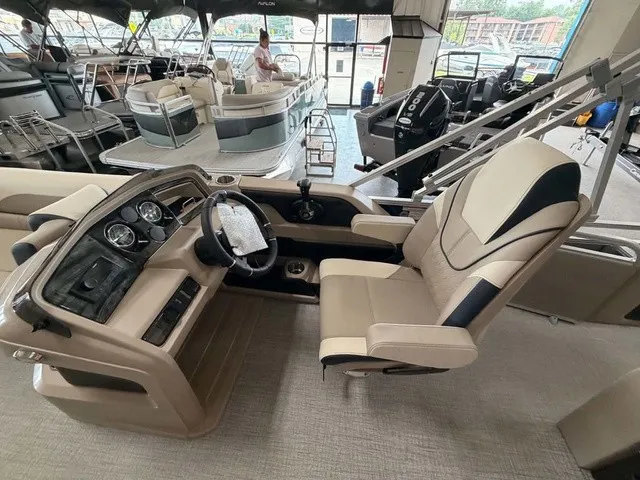 Slide: The Image of The image shows the cockpit of a 2027 Avalon LSZ 2385 VRB with beige and black seating. - 7