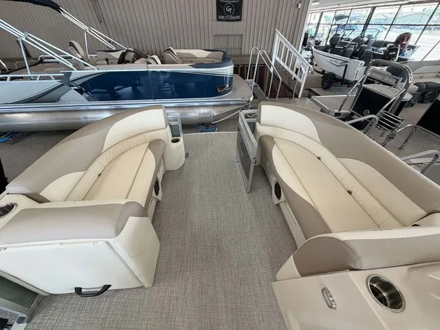 Slide: The Image of Interior view of a modern pontoon boat with beige and white seating. - 3