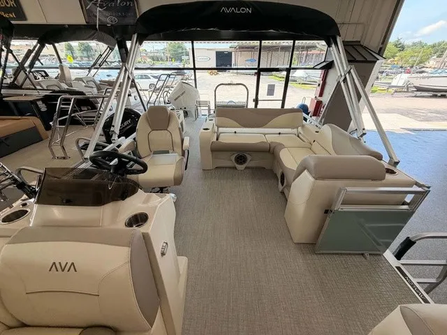 Slide: The Image of Interior of a 2027 Avalon VEN 23E85 VRB with beige seating and modern design. - 6