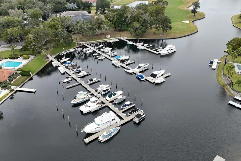 Slide: The Image of Aerial view of marina with boats, including a 2003 Sea Ray 340 Sundancer. - 86