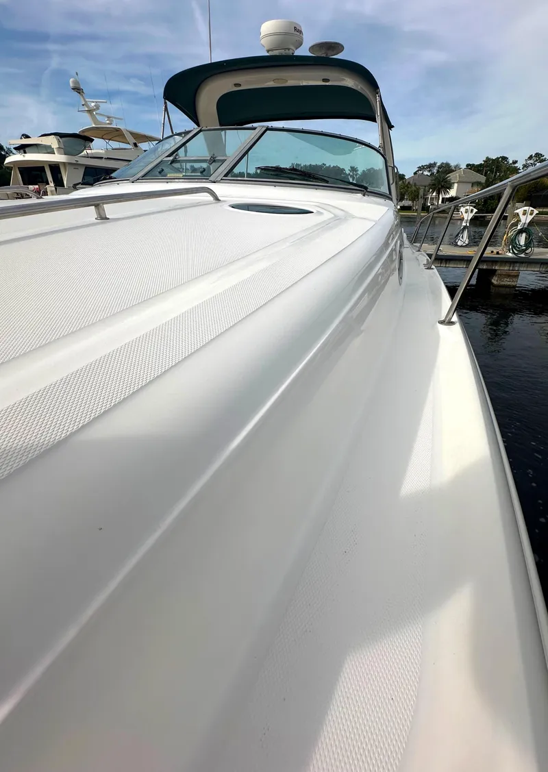Slide: The Image of 2003 Sea Ray 340 Sundancer yacht docked at marina. - 18