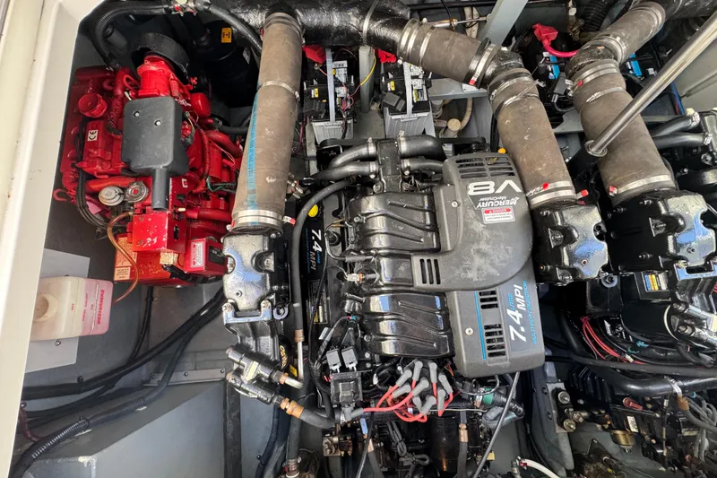 Slide: The Image of Engine compartment of a 2001 Sea Ray 340 Sundancer with Mercury 7.4L MPI engine. - 35