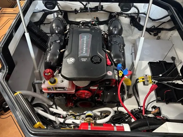Slide: The Image of Engine compartment of a 2027 Cobalt R4 Surf with clean wiring and modern technology. - 15