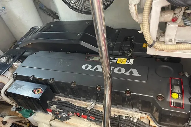 Slide: The Image of Engine compartment of a 2008 Princess V53 yacht featuring a Volvo engine. - 39