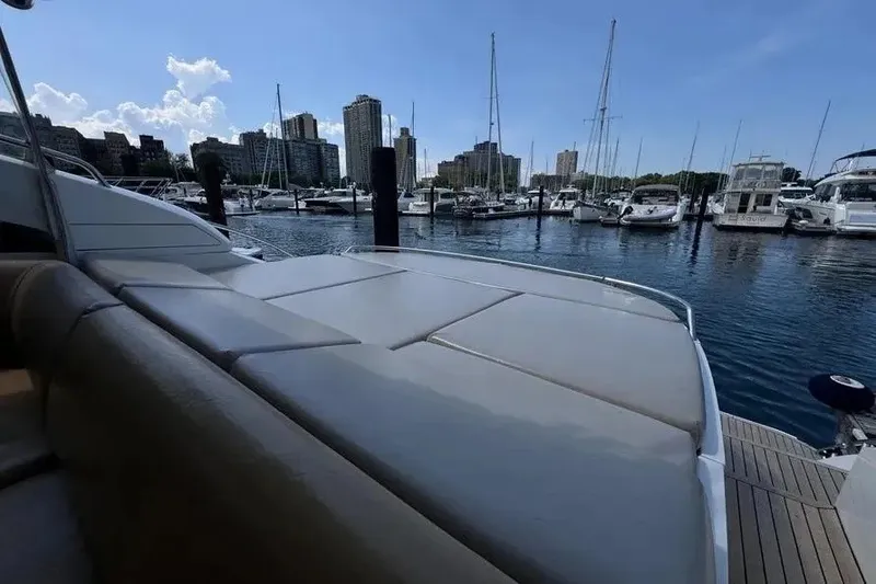 Slide: The Image of Luxury yacht Princess V53 (2008) docked at marina with city skyline. - 21