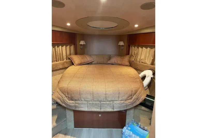 Slide: The Image of Luxurious cabin interior of 2008 Princess V53 yacht with cozy bed and ambient lighting. - 31