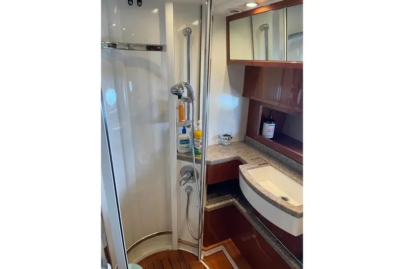 Slide: The Image of Luxurious bathroom in 2008 Princess V53 yacht with modern shower and sleek vanity. - 32