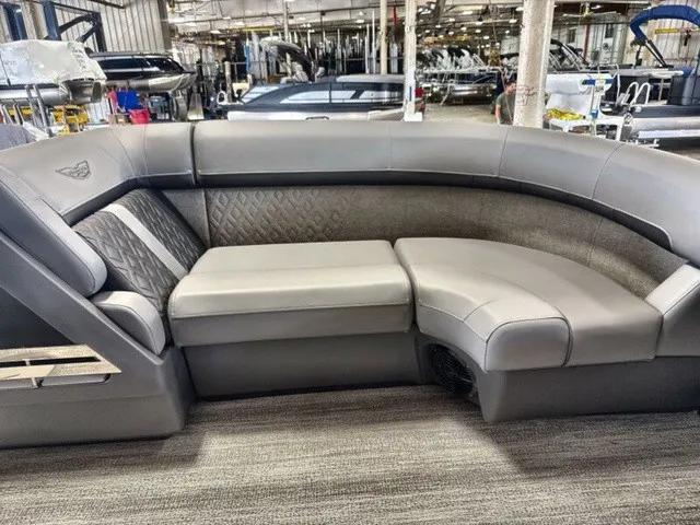 Slide: The Image of Interior view of a Bennington M Fishing 22 MFC Tritoon with gray upholstery and sleek stitching. - 10