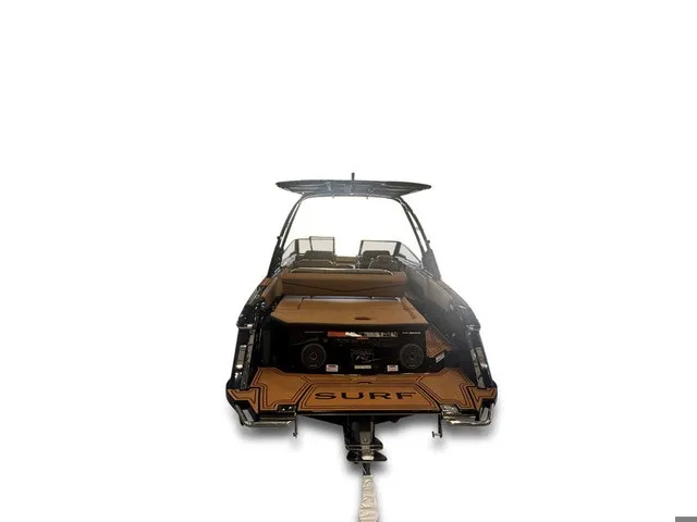 Slide: The Image of The image shows a 2027 Cobalt R4 Surf boat with sleek design and surfboard mounts. - 6