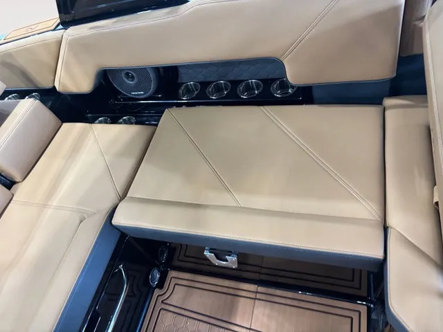 Slide: The Image of The interior of the 2027 Cobalt R4 Surf features beige upholstery and integrated speakers. - 9