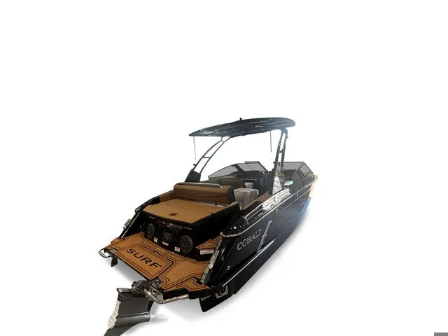 Slide: The Image of The image shows a modern 2027 Cobalt R4 Surf boat with sleek design and spacious deck. - 7