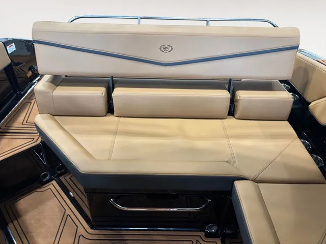 Slide: The Image of The 2027 Cobalt R4 Surf features luxurious beige upholstery with blue accents and a sleek design. - 8