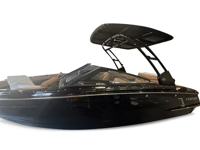 Slide: The Image of The image shows a sleek black Cobalt R4 Surf boat with a modern design and comfortable seating. - 4