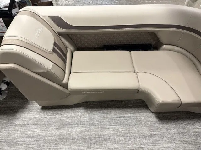 Slide: The Image of Beige seating with quilted pattern and brown accents on a boat. - 16