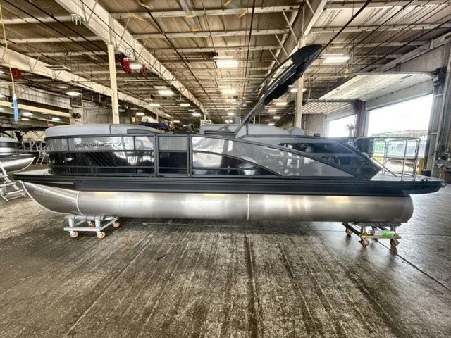 Slide: The Image of A 2027 Bennington M Fishing 22 MFC Tritoon is situated in a large warehouse. - 5
