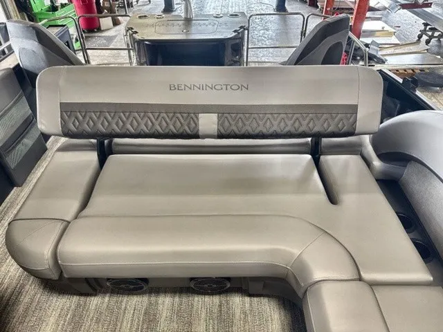 Slide: The Image of Gray upholstery on a Bennington boat with quilted pattern and built-in speaker. - 16