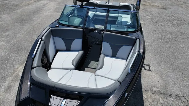 Slide: The Image of The image shows the cockpit of a 2019 MasterCraft XT22 with gray and white seating. - 3