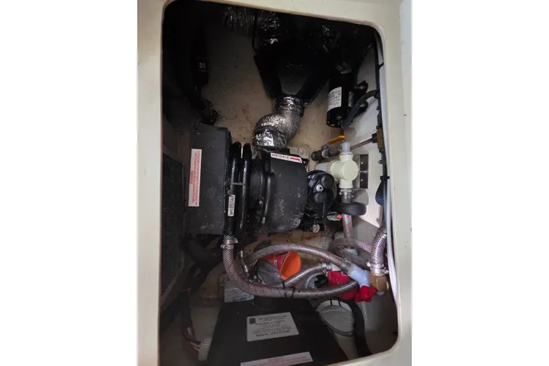 Slide: The Image of Engine compartment of a 2011 Hake Seaward 32RK sailboat, showing mechanical components. - 41