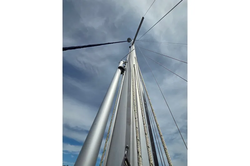 Slide: The Image of Mast of 2011 Hake Seaward 32RK sailboat against a cloudy sky. - 13