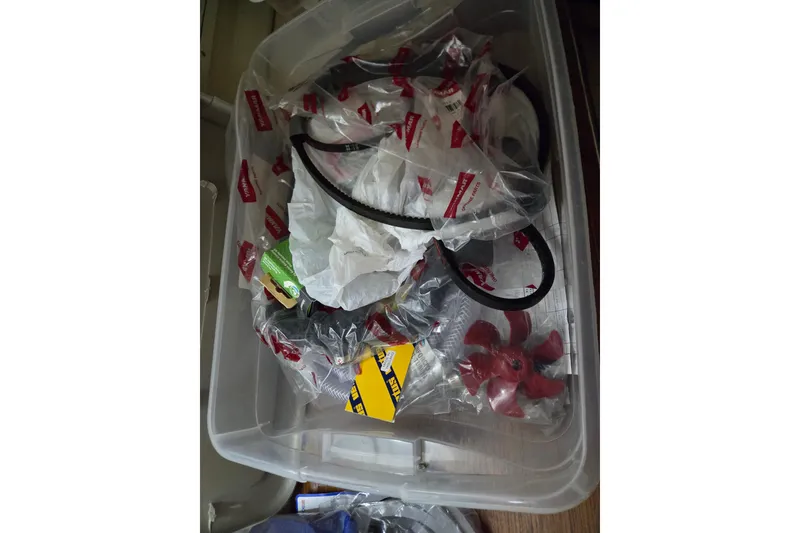 Slide: The Image of Plastic container with assorted boat parts for 2011 Hake Seaward 32RK. - 45