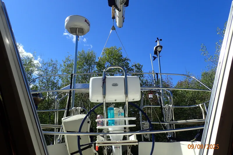 Slide: The Image of Sailboat deck view of 2011 Hake Seaward 32RK under clear blue sky. - 53