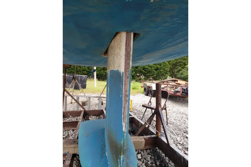 Slide: The Image of 2011 Hake Seaward 32RK sailboat keel on a trailer, outdoor setting. - 54