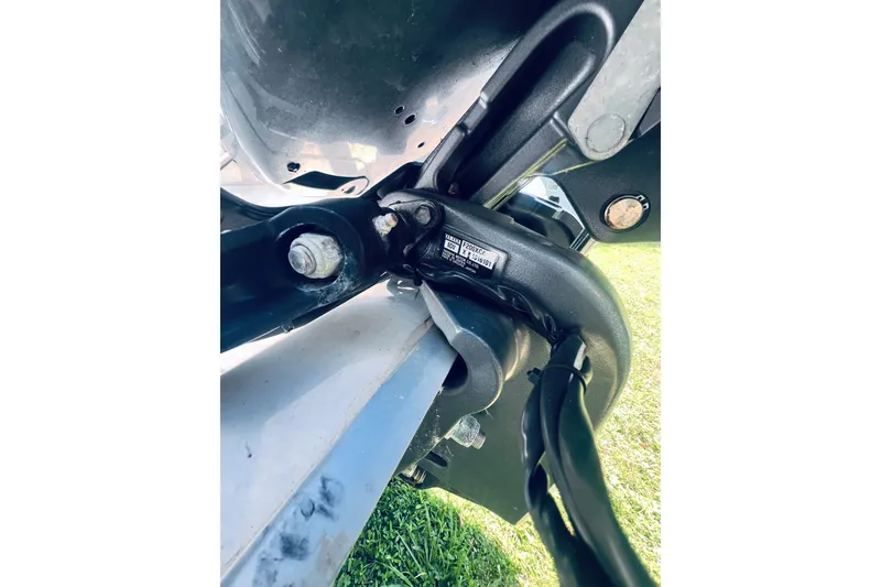 Slide: The Image of Close-up of 2021 Tidewater 256 CC Adventure boat engine components. - 8