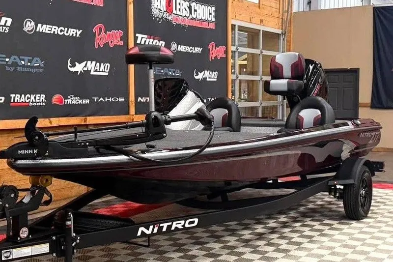 Slide: The Image of 2027 Nitro Z17 boat on display, featuring sleek design and modern seating. - 14